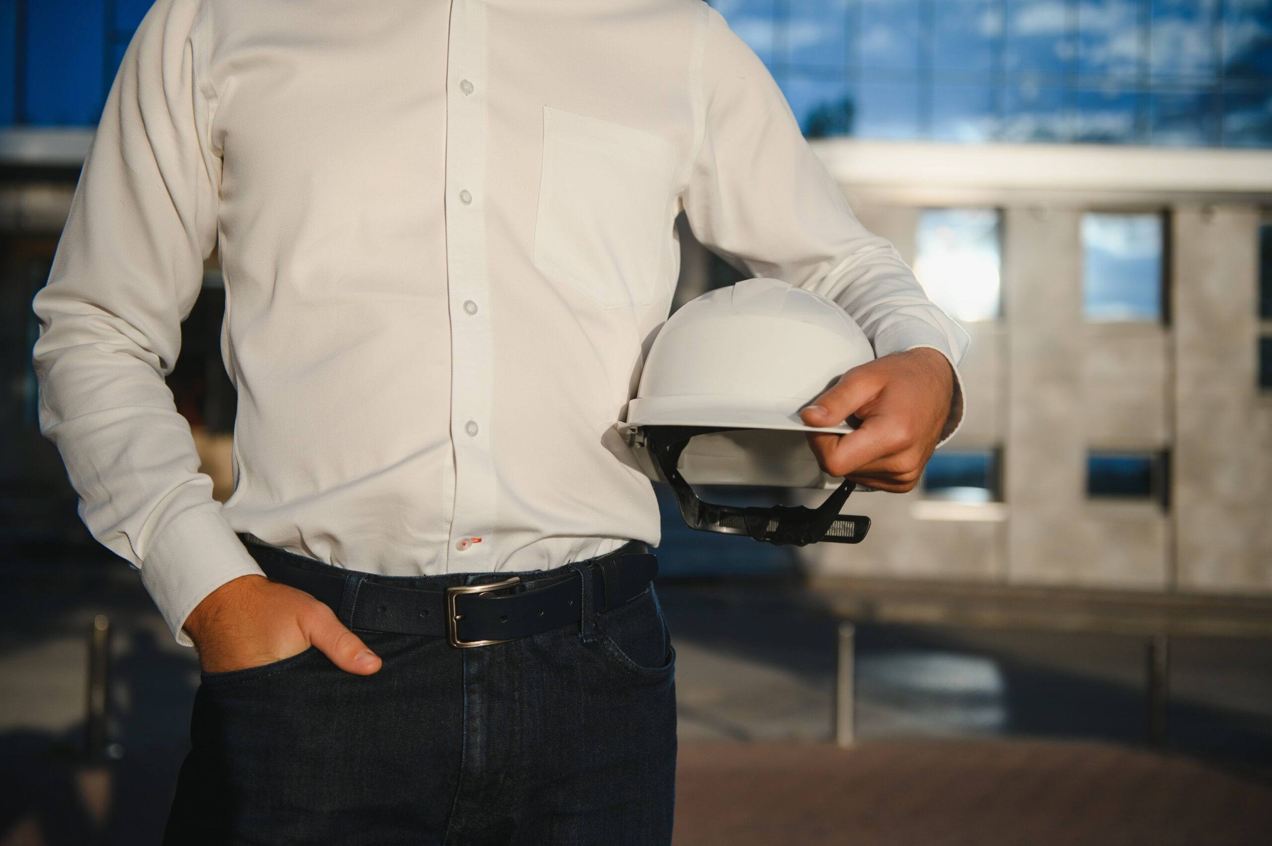 hand-s-engineer-worker-holding-safety-helmet-with-2023-11-27-05-30-31-utc-min hand-s-engineer-worker-holding-safety-helmet-with-2023-11-27-05-30-31-utc-min